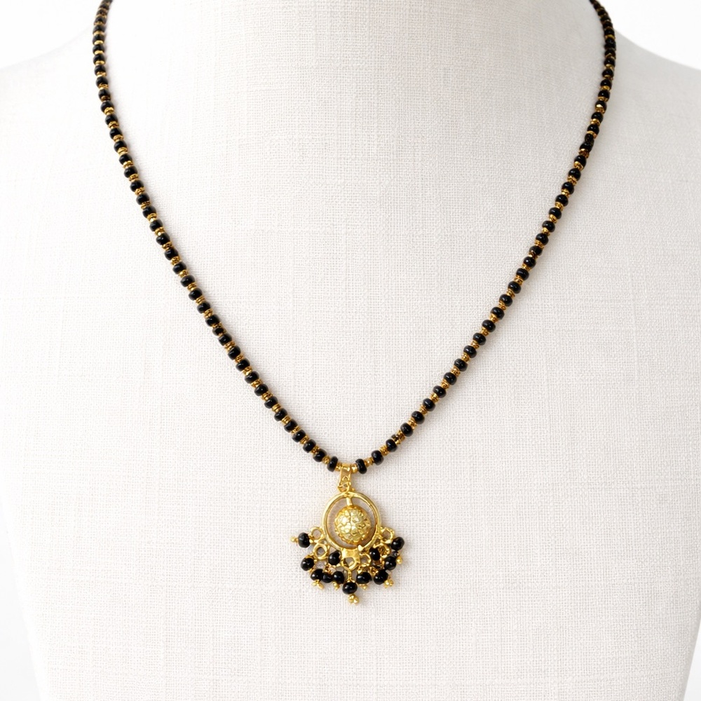 Stunning Gold and Black Pendant Necklace